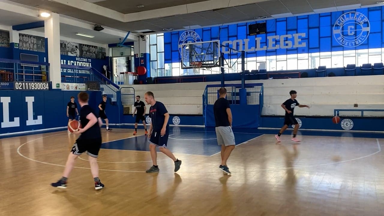 Coach setting up a pick-and-roll small-sided game.