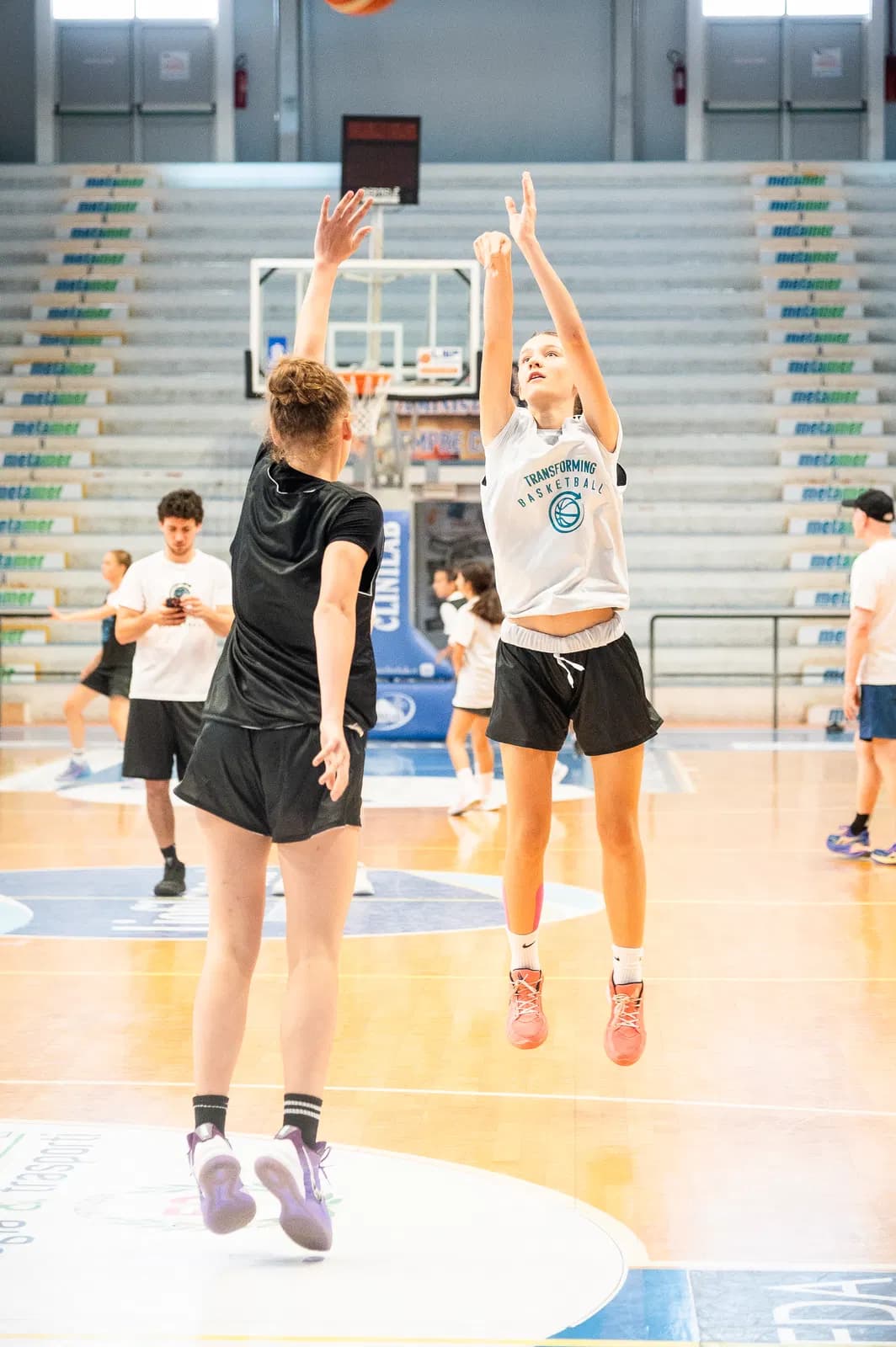 A player shooting over a closeout defender