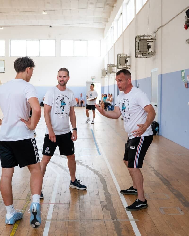 Players and coaches at a past Transforming Basketball event (photo 1)