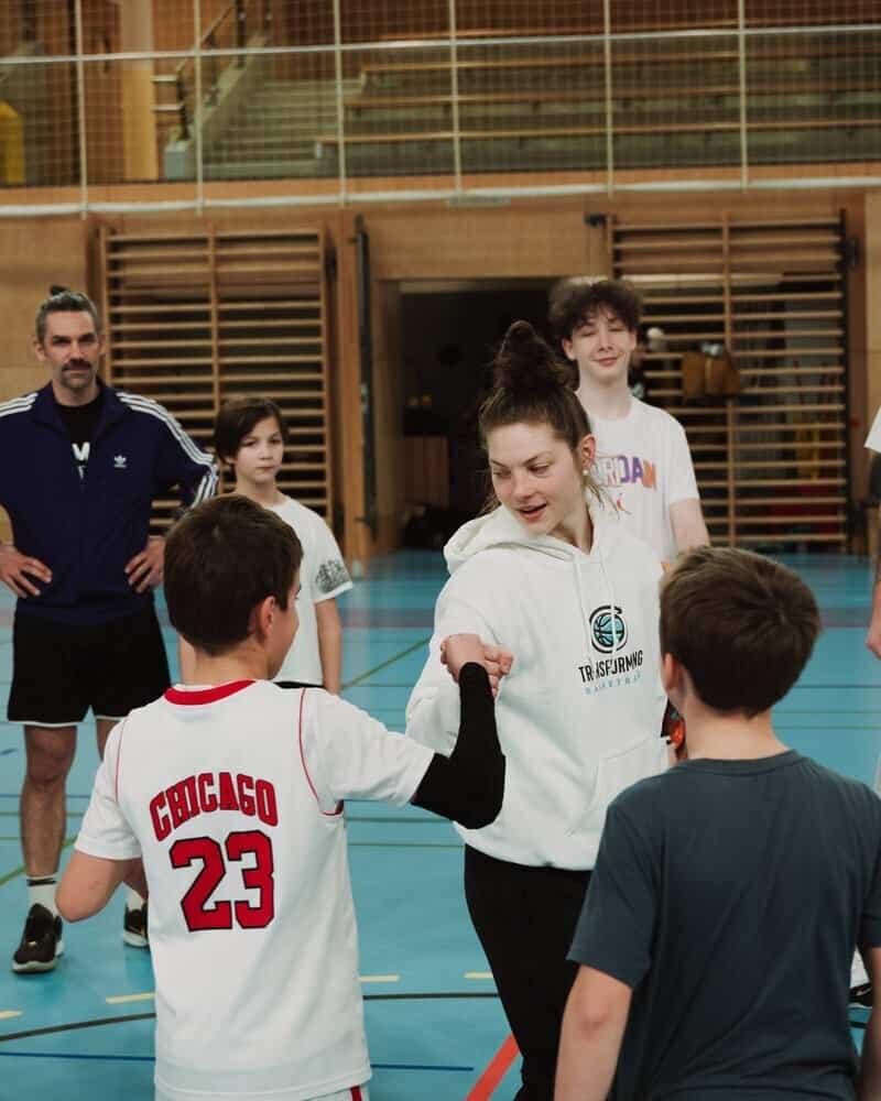 Players and coaches at a past Transforming Basketball event (photo 3)