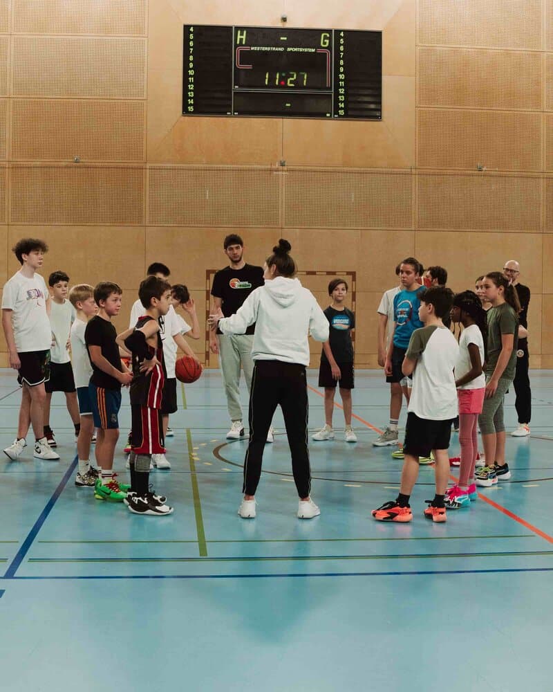 Players and coaches at a past Transforming Basketball event (photo 4)
