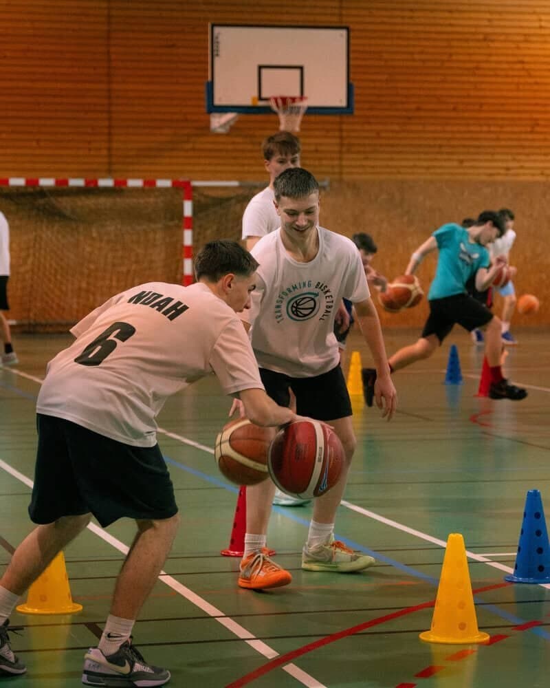 Players and coaches at a past Transforming Basketball event (photo 16)