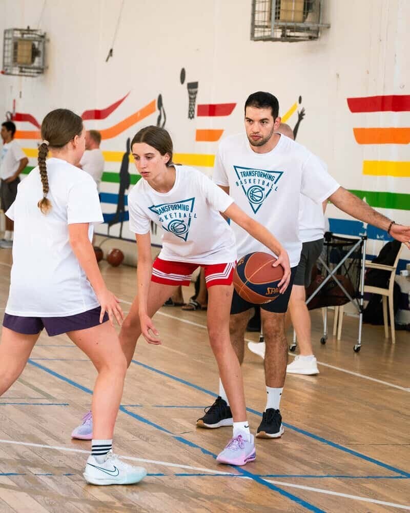 Players and coaches at a past Transforming Basketball event (photo 17)